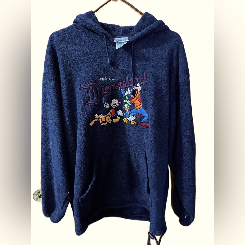 Men’s Disneyland fleece hoodie with Disneyland embroidered characters.
